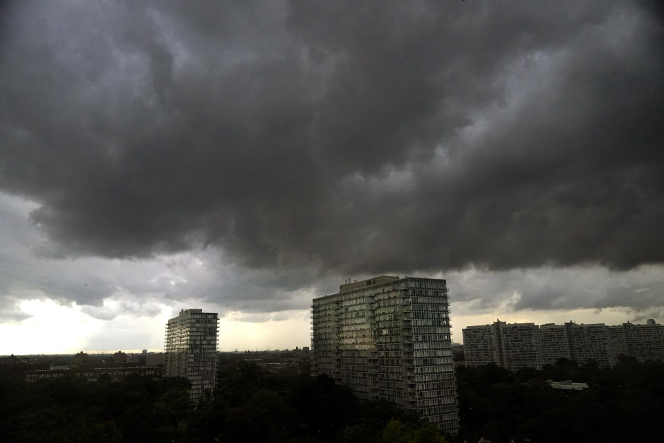 Storm clouds pass over the Bronzville neighborhood of Chicago heading East out over Lake Michigan as the National Weather Service continued to issue multiple tornado warnings in the greater metropolitan area Wednesday, July 12, 2023. (AP Photo/Charles Rex Arbogast)