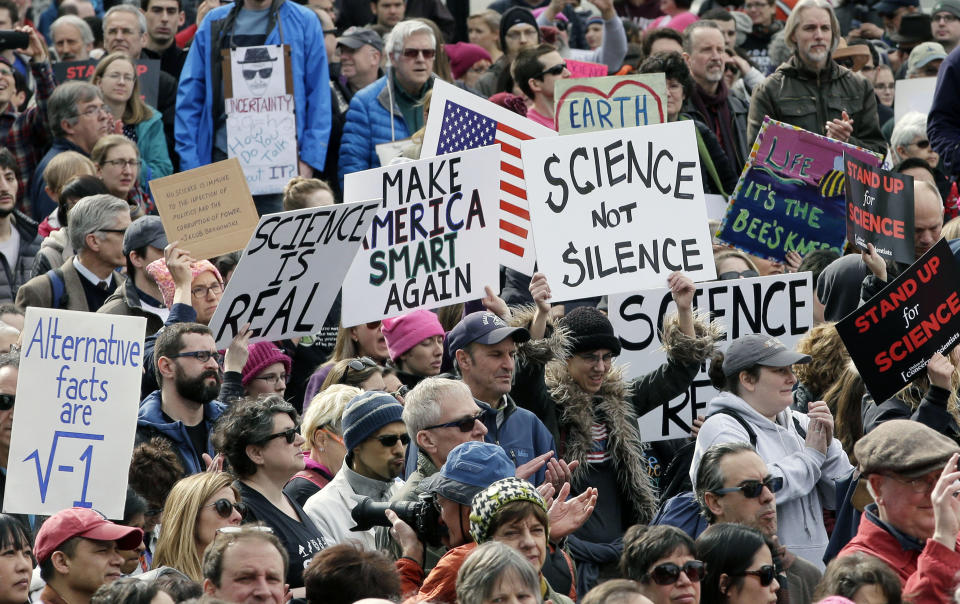 Members of the scientific community, environmental advocates, and supporters demonstrate Sunday, Feb. 19, 2017, in Boston, to call attention to what they say are the increasing threats to science and scientific research under the administration of President Donald Trump. (AP Photo/Steven Senne)