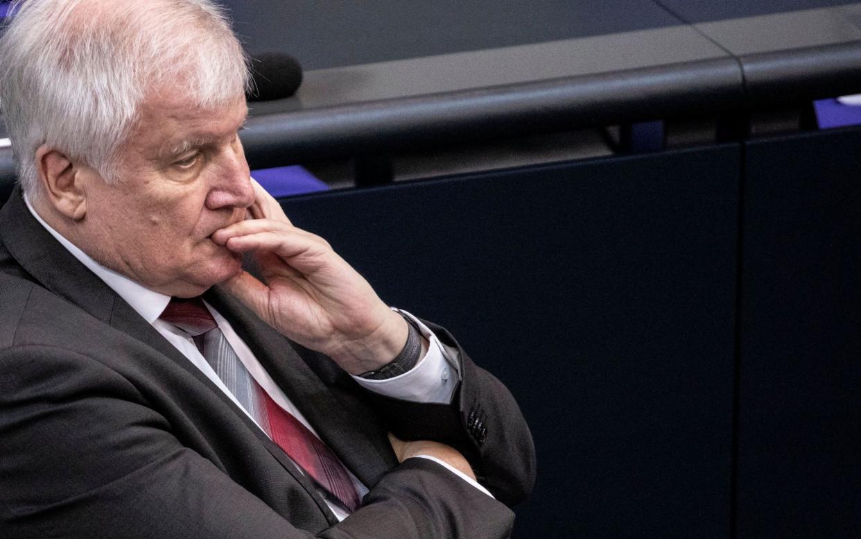 Mandatory Credit: Photo by OMER MESSINGER/EPA-EFE/Shutterstock (10700835a) German Minister of Interior, Construction and Homeland Horst Seehofer attends the parliament session at the Bundestag, in Berlin, Germany, 03 July, 2020. Bundestag session, Berlin, Germany - 03 Jul 2020 - OMER MESSINGER/EPA-EFE/Shutterstock