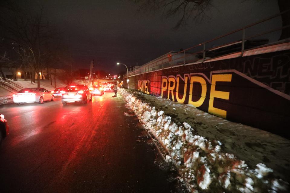 Free the People Roc and supporters protested the grand jury's decision not to indict the Rochester police officers involved in Daniel Prude's death on February 23, 2021.  The protest started on Jefferson Avenue in Rochester, NY and went to the Rochester Police Department Special Operations Division on Child Street walking by Daniel Prudes's name on the wall.  Prude's brother, Joe Prude lives near this mural.