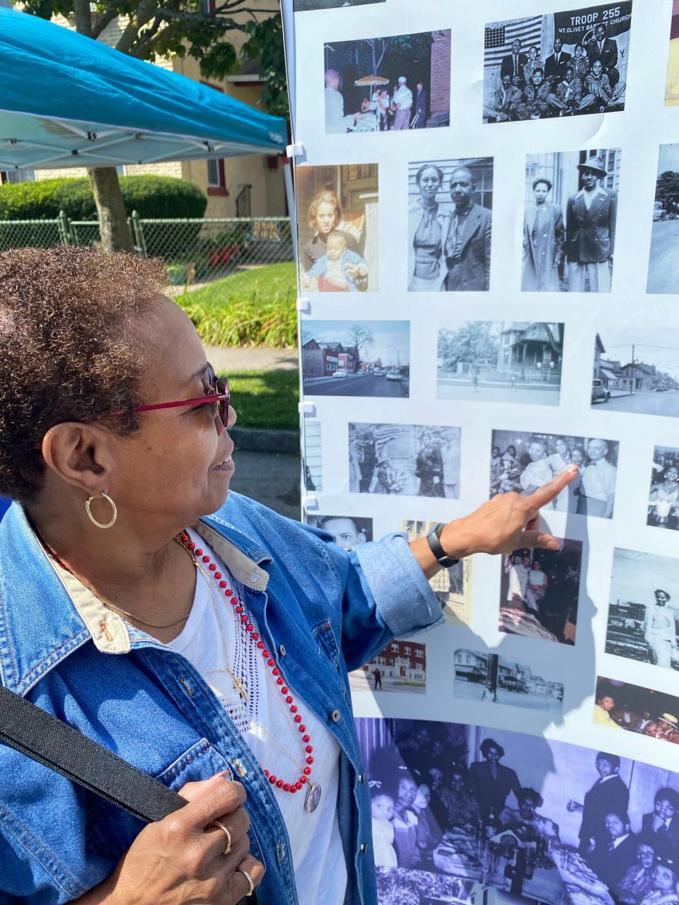 Toni Lomax is a lifelong Rochester resident who grew up in the Third Ward before it was known as Corn Hill. She’s pointing at her mother, Mary Tyson, who worked at the Pythodd Club.