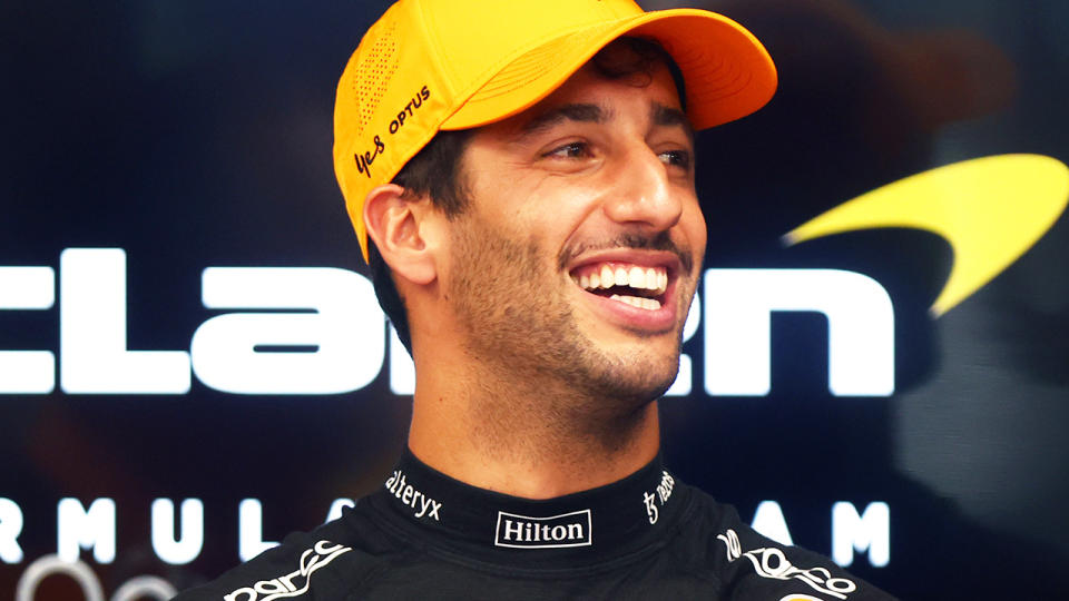 Daniel Ricciardo smiles in the McLaren garage at the Singapore GP.