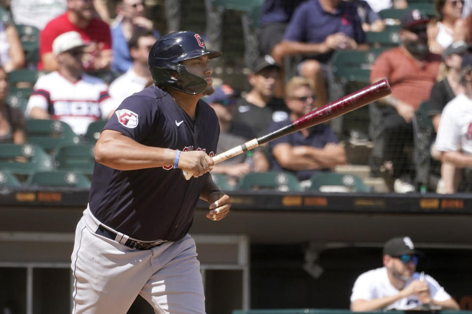 Cleveland Guardians pinch-hitter Josh Naylor watches his RBI-singles off Chicago White Sox relief pitcher Liam Hendriks in the ninth inning of the first game of a baseball doubleheader Saturday, July 23, 2022, in Chicago. (AP Photo/Charles Rex Arbogast)