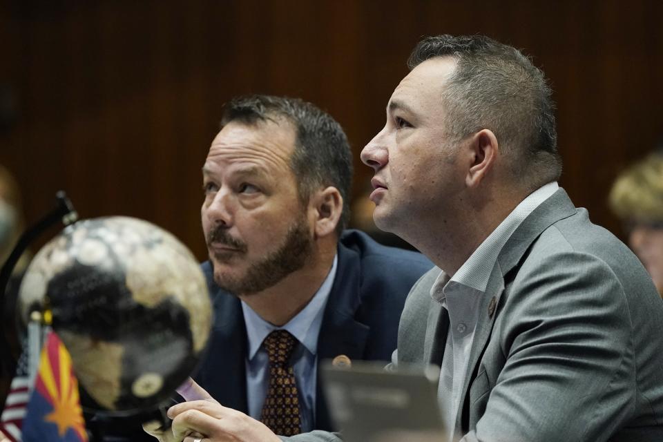 Arizona House Majority Leader Ben Toma, R-Peoria, right, watches the voting board along with Rep. Jeff Weninger, R-Chandler, during a vote on the Arizona budget Thursday, June 24, 2021, in Phoenix. (AP Photo/Ross D. Franklin)