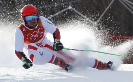 Alpine Skiing - Pyeongchang 2018 Winter Olympics - Men's Giant Slalom - Yongpyong Alpine Centre - Pyeongchang, South Korea - February 18, 2018 - Marcel Hirscher of Austria competes. REUTERS/Stefano Rellandini