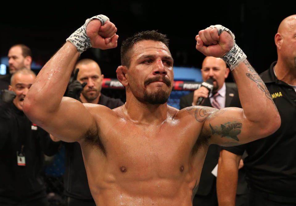 Rafael Dos Anjos of Brazil celebrates after his submission victory over Kevin Lee in their welterweight bout during the UFC Fight Night event at Blue Cross Arena on May 18, 2019 in Rochester, New York.