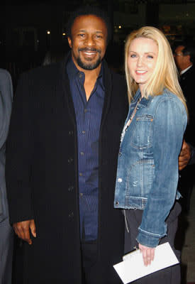 Director Thomas Carter and guest at the Hollywood premiere of Paramount Pictures' Coach Carter