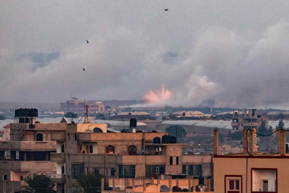 Flashes are seen lighting up the sky during an Israeli military attack on Rafah in the southern Gaza Strip on November 2, 2023, amid the ongoing battles between Israel and the Palestinian group Hamas.