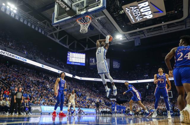 Kentucky forward Chris Livingston slams down two points against Kansas at Rupp Arena in the first half.  Jan. 28, 2023