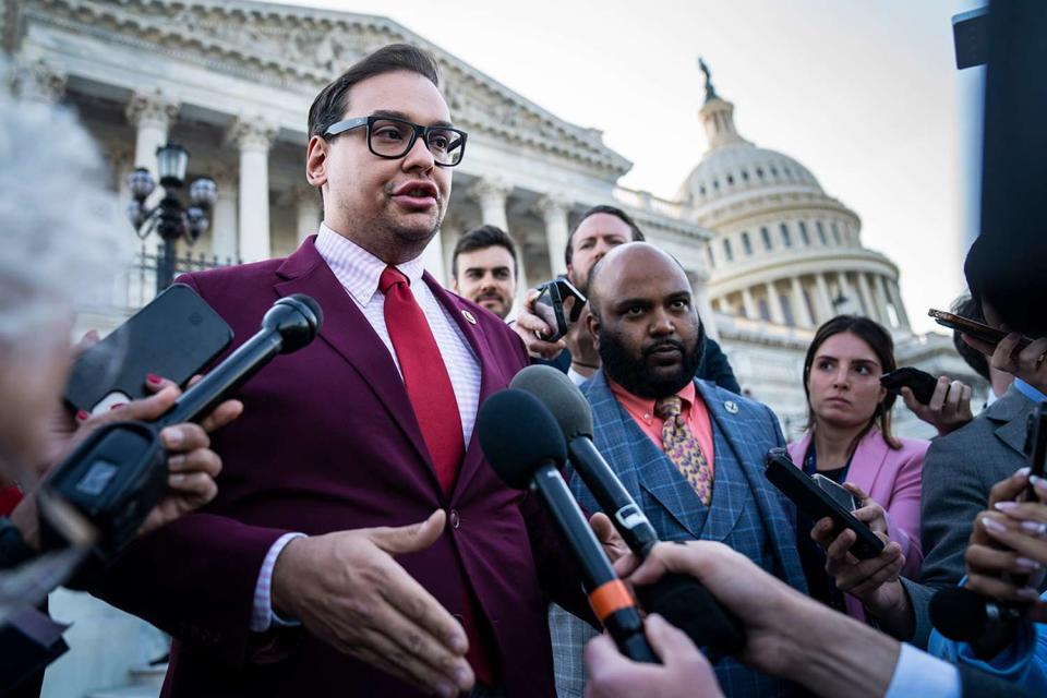 <p>Jabin Botsford/The Washington Post via Getty</p> Republican Rep. George Santos of New York speaks to reporters on Capitol Hill in May 2023