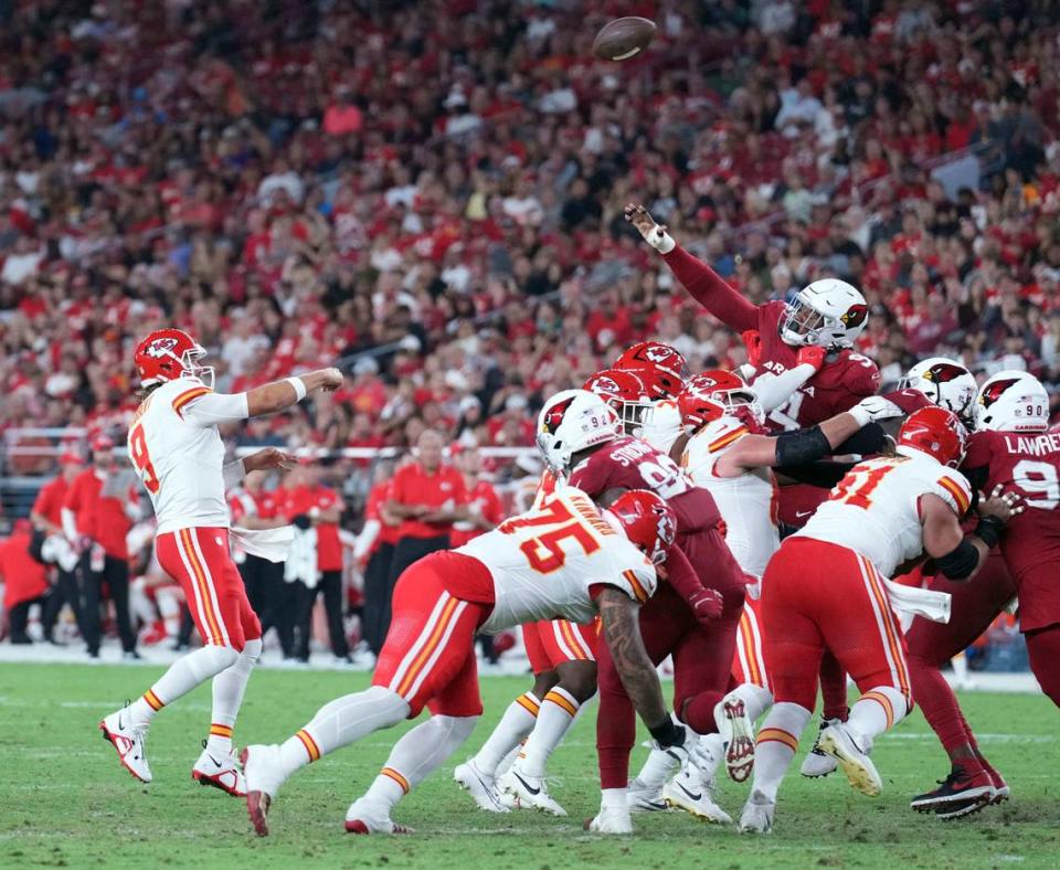 Kansas City Chiefs quarterback Blaine Gabbert (9) throws against the Arizona Cardinals during the second half of a preseason game at State Farm Stadium on Aug. 19, 2023.