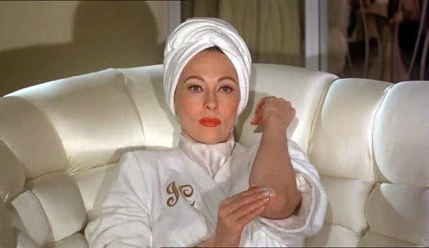 Faye Dunaway plotting revenge against her daughter Christina in Mommie Dearest.