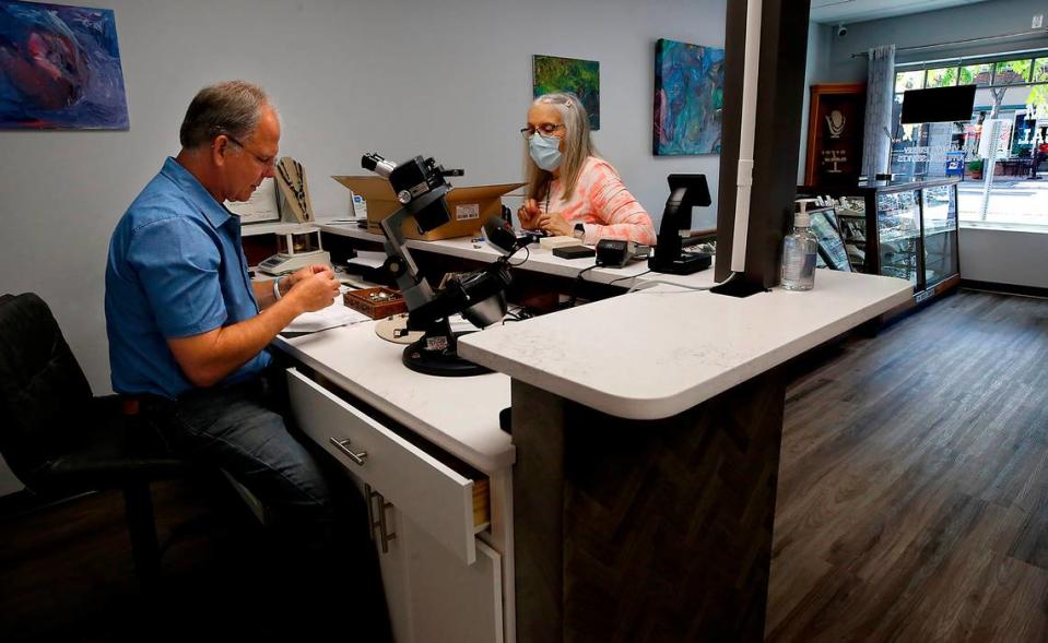 Dennis Schoeneberg of Desert Gem & Appraisal, said his downtown Kennewick business suffered only minor damage after a recent fire at the adjacent Cascade Building. Desert Gem had to be rebuilt after an earlier, devastating fire in the same building in February 2022.