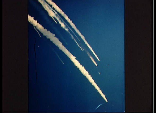 These photographs of the Space Shuttle Challenger accident January 28, 1986 was taken by a 70mm tracking camera at UCS 15 south of Pad 39B, at 11:39:28.161 EST and 11:39:29.094. Notice the smoke trails caused by flying debris. (NASA-JSCJan. 28, 1986) (<a href="http://history1900s.about.com/od/photographs/ig/Space-Shuttle-Challenger/" target="_hplink">Via About.com</a>)