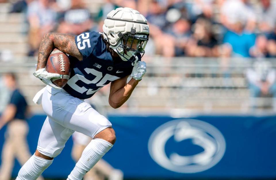 Penn State cornerback Daequan Hardy runs with the ball during the Blue-White game on Saturday, April 23, 2022.