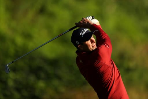 Australia's Adam Scott trailed Justin Thomas by one stroke when darkness halted the third round of the rain-hit Genesis Open