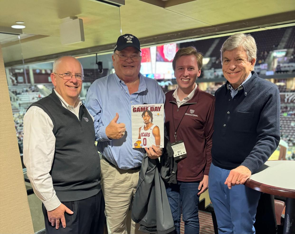 Clif Smart, Billy Long, Bradley Cooper and Roy Blunt attend a Missouri State University football game.