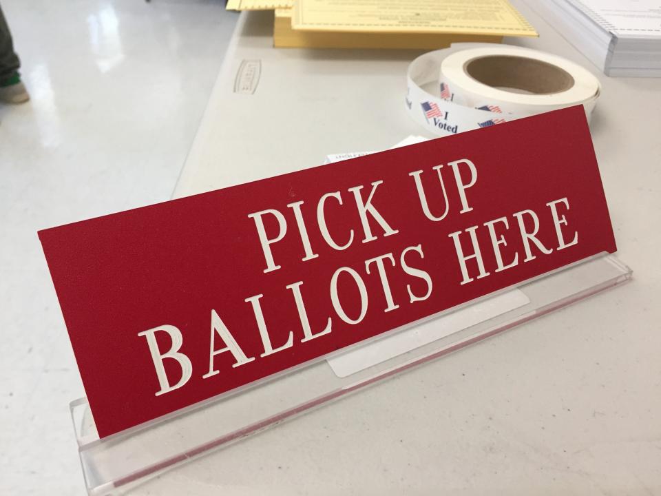 The voter check-in table on Town Meeting Day in Burlington on March 3, 2020.