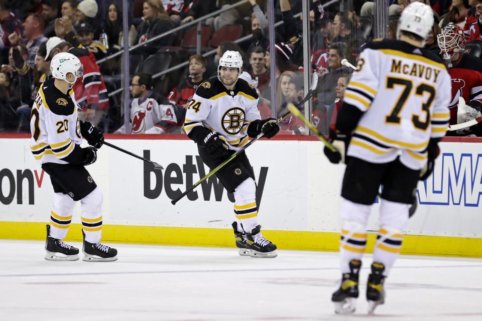 Bruins left wing Jake DeBrusk (74) reacts after scoring an empty net goal against the New Jersey Devils earlier this season.