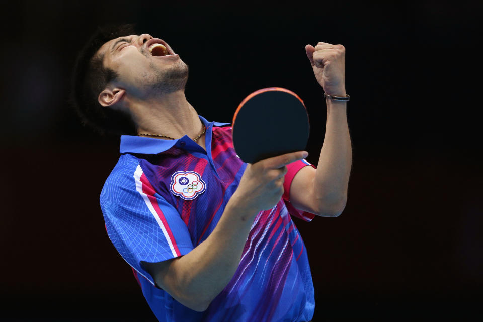 LONDON, ENGLAND - AUGUST 02:  Chih-Yuan Chuang of Chinese Taipei celebrates a point during Men's Singles Table Tennis Bronze medal match against Dimitrij Ovtcharov of Germany on Day 6 of the London 2012 Olympic Games at ExCeL on August 2, 2012 in London, England.  (Photo by Feng Li/Getty Images)