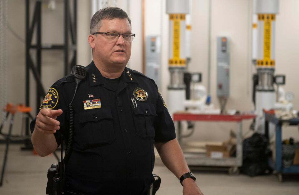 Larimer County Sheriff Justin Smith discusses new facilities during a tour at the Larimer County Jail in Fort Collins, Colo. on Thursday, July 22, 2021. 