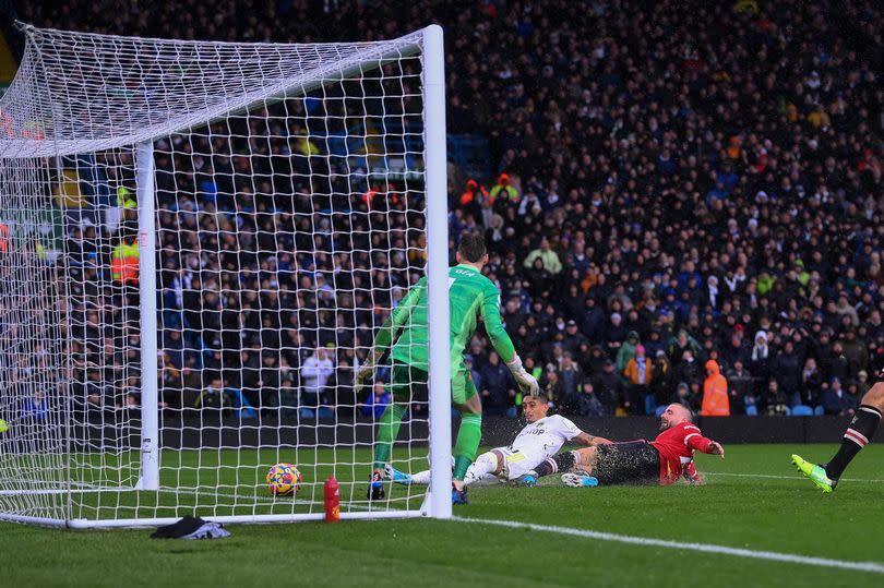 Former Leeds United winger Raphinha pictured scoring against Manchester United