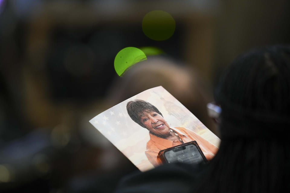 A mourner holds a program during funeral services for former U.S. Rep. Eddie Bernice Johnson at Concord Church on Tuesday, Jan. 9, 2024, in Dallas. (Smiley N. Pool/The Dallas Morning News via AP, Pool)