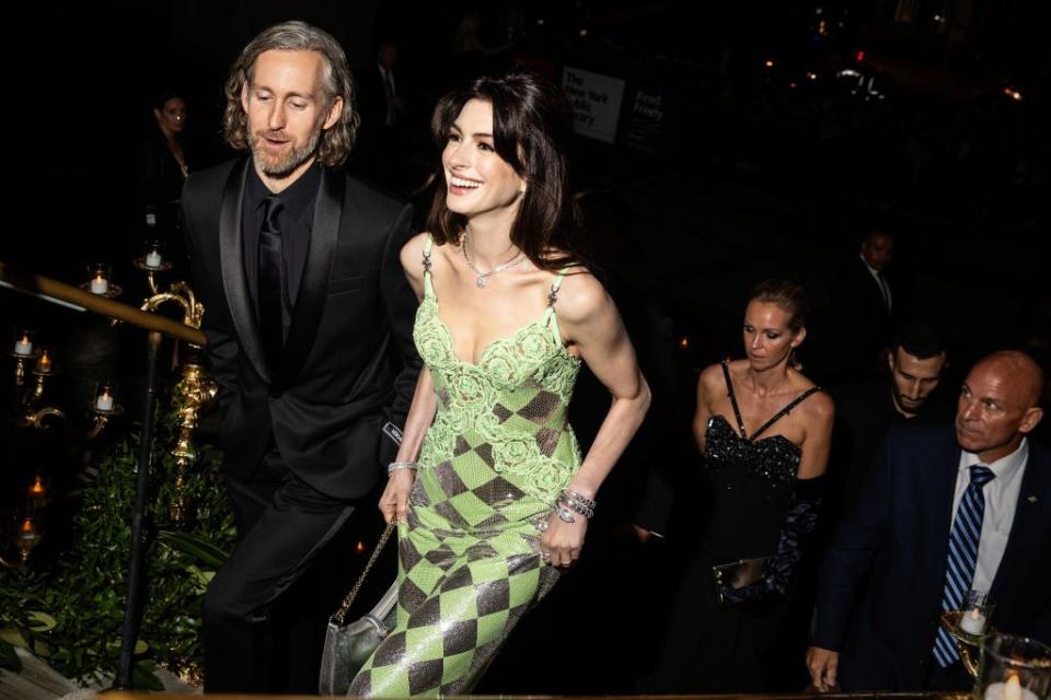 anne hathaway with husband at clooney foundation for justice's