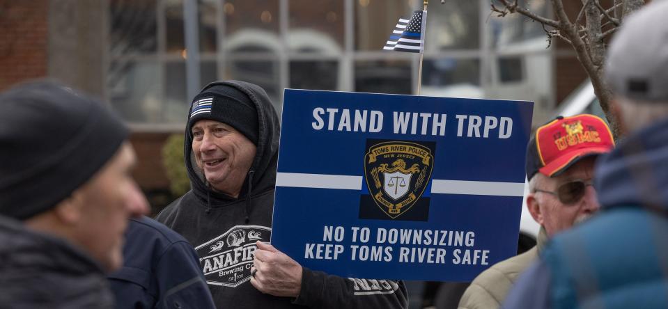 Retired Toms River Policeman Dave McCallum come to a rally Tuesday, Jan. 30, 2024, to protest a proposal to cut two police captains' jobs to pay for eight EMTs.