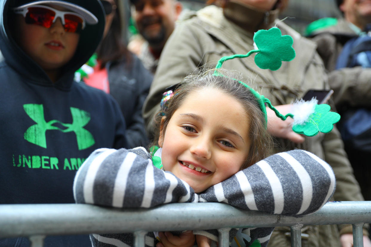 A youngster poses for a photo during a break in marching in the St. Patrick's Day Parade, March 16, 2019, in New York. (Photo: Gordon Donovan/Yahoo News) 