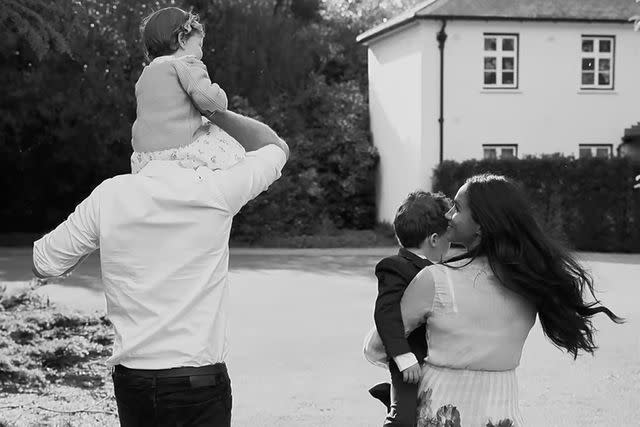 Netflix/Youtube A photo of Prince Harry, Princess Lilibet, Meghan Markle and Prince Archie from the December 2022 docuseries 'Harry & Meghan' on Netflix.