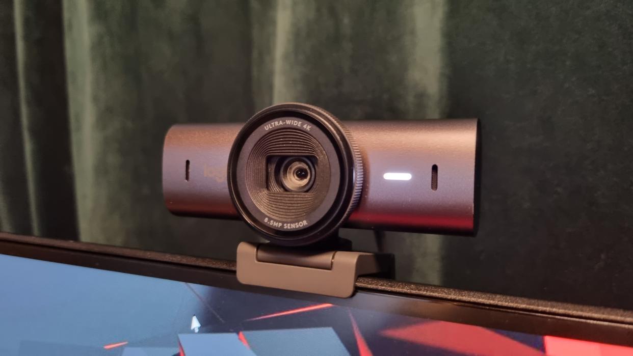  The Logitech MX Brio 4K webcam mounted to the top of a monitor. 