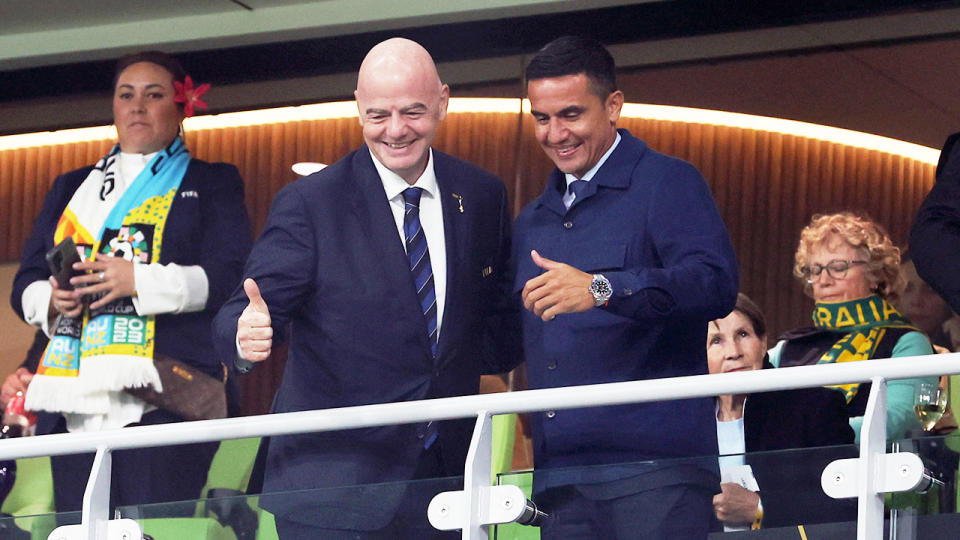 Gianni Infantino and Tim Cahill watch the Matildas' World Cup group stage game against Canada. Pic: Getty