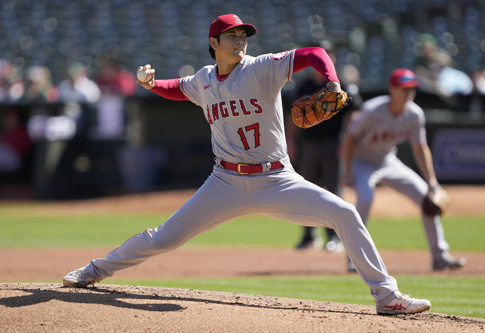 OAKLAND, CALIFORNIA - OCTOBER 05: Shohei Ohtani #17 of the Los Angeles Angels pitches against the Oakland Athletics in the bottom of the first inning at RingCentral Coliseum on October 05, 2022 in Oakland, California. (Photo by Thearon W. Henderson/Getty Images)