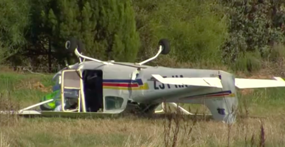 A pilot has miraculously survived a crash landing in which the Cessna he was flying ended up on its roof. Source: 7 News