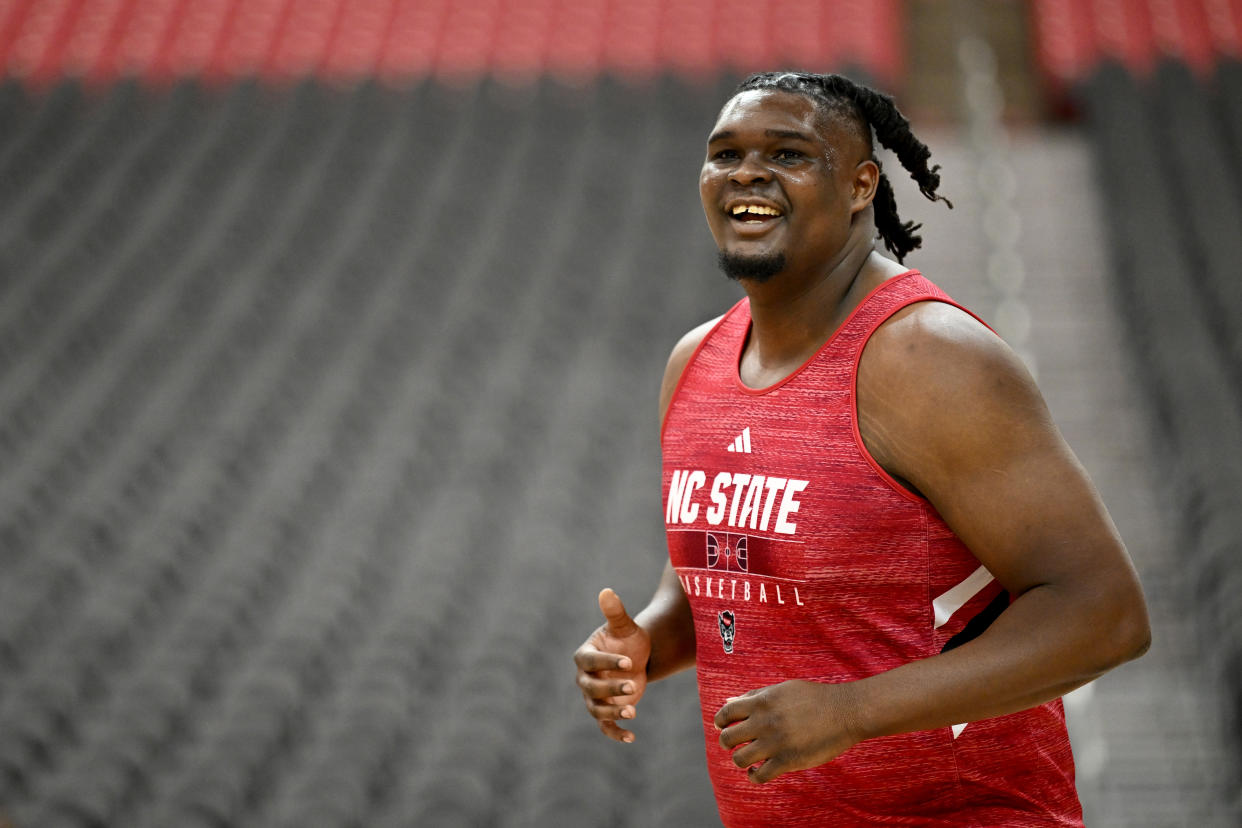 GLENDALE, ARIZONA - APRIL 05: DJ Burns Jr. #30 of the North Carolina State Wolfpack smiles during Final Four Friday for the NCAA Men's Basketball Tournament at State Farm Stadium on April 05, 2024 in Glendale, Arizona. (Photo by Brett Wilhelm/NCAA Photos via Getty Images)