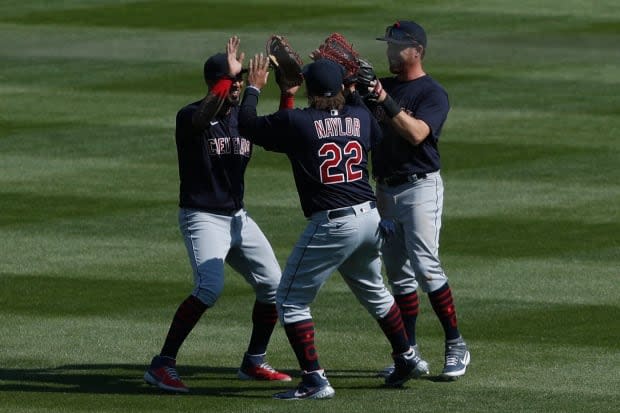 Naylor celebrates with teammates after a win over Detroit earlier this year.