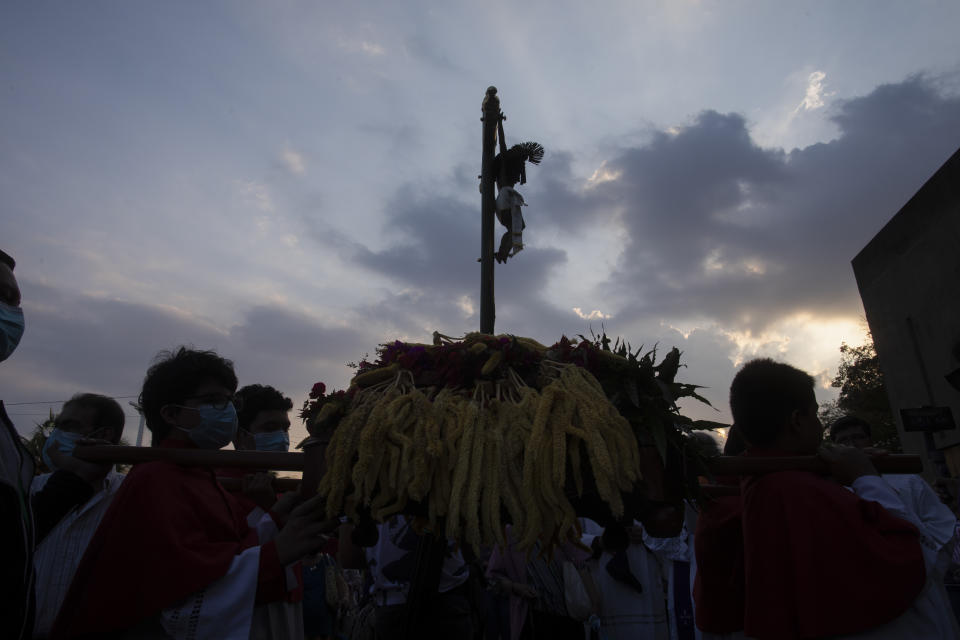 Catholics take part in a reenactment of the Stations of the Cross during the Lenten season at the Metropolitan Cathedral in Managua, Nicaragua, Friday, March 17, 2023. Amid tensions between the Vatican and the Daniel Ortega government, Catholics staged the devotional commemoration of Jesus Christ's last day on Earth in the gardens of the Cathedral due to the police ban on celebrating religious festivities on the streets. (AP Photo/Inti Ocon)