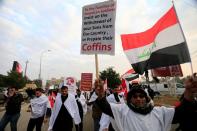 Supporters of Iraqi Shi'ite cleric Moqtada al-Sadr protest against what they say is U.S. presence and violations in Iraq, during a demonstration in Baghdad