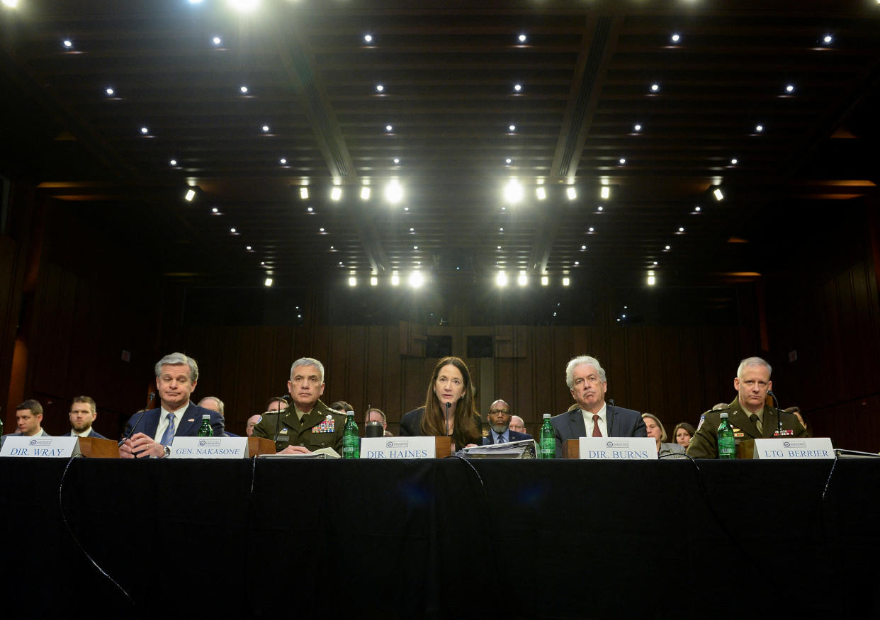 From left to right, FBI Director Christopher Wray, National Security Agency Director Paul Nakasone, Director of National Intelligence Avril Haines, Central Intelligence Agency Director William Burns and Defense Intelligence Agency Director Scott Berrier 