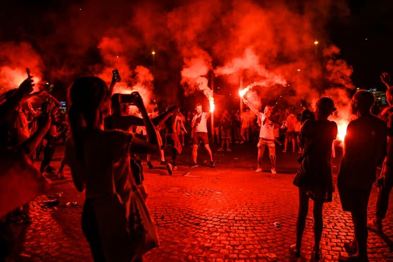 Fans celebrated with flares after France's World Cup victory