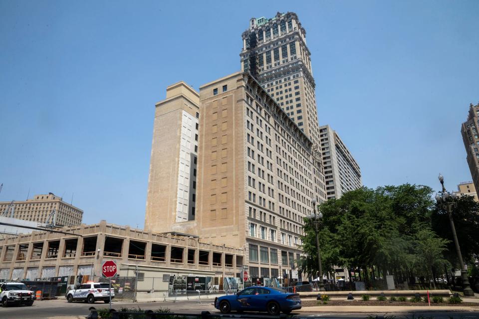 Law enforcement vehicles are parked downtown during the Book Tower ribbon-cutting ceremony in Detroit on Thursday, June 8, 2023.