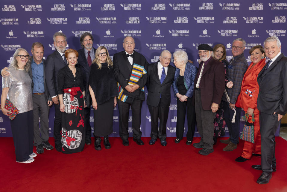 From left, Ellen Lewis, Bradley Thomas, Thomas Nellen, Marianne Bower, Jack Fisk, Jacqueline West, Chief Standing Bear, Martin Scorsese, Thelma Schoonmaker, Mark Ulano, Rene Haynes, Chad Renfro, Julie O'Keefe and Daniel Lupi pose for photographers upon arrival for the premiere of the film 'Killers of the Flower Moon' at the 2023 London Film Festival in London, Saturday, Oct. 7, 2023. (Photo by Vianney Le Caer/Invision/AP)