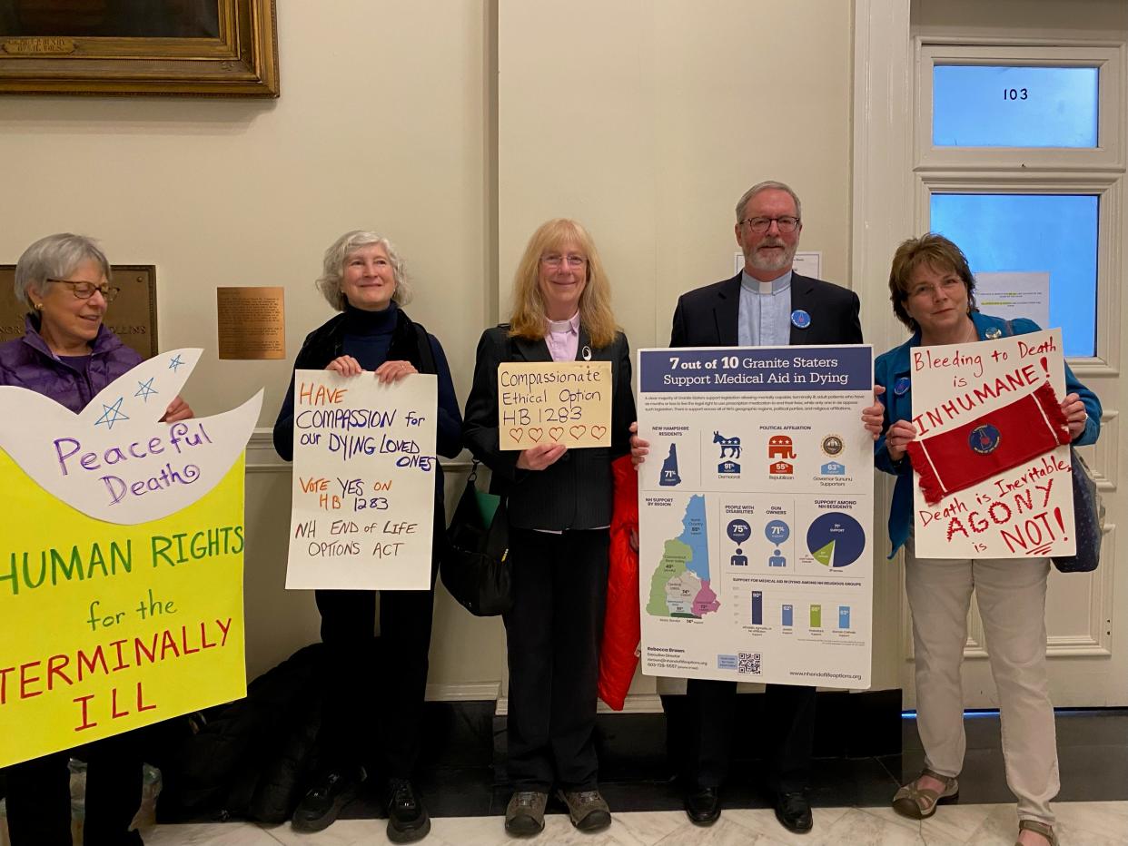 Supporters of the End of Life Options Act, including the Director of NH Alliance for End of Life Options Rebecca Brown (middle), gather outside the Senate Health and Human Services committee on Thursday, April 25, 2024.