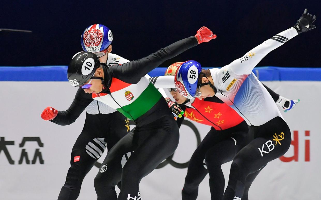 Sandor Liu Shaolin (L) of Hungary, Hyo Jun Lim (2-L) of South Korea, Dajing Wu (3-L) of China and Dae Heon Hwang of South Korea compete in the men's 500m final during the first stage of the ISU World Cup Short Track Speed Skating qualification series for the XXIII Olympic Winter Games in BOK Sports Hall in Budapest, Hungary, 30 September 2017. The Winter Olympics will be held in PyeongChang, South Korea between 09 and 25 February 2018. - Zsolt Czegledi /EPA