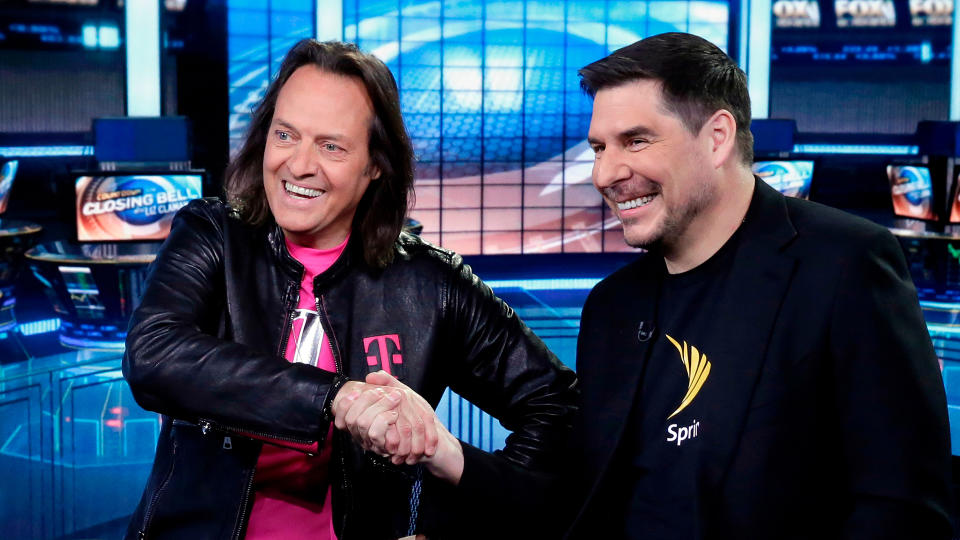 Mandatory Credit: Photo by Richard Drew/AP/REX/Shutterstock (9646697a)John Legere, Marcelo Claure.