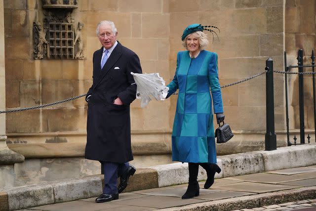<p>JONATHAN BRADY/POOL/AFP via Getty</p> Then-Prince Charles and Camilla, Duchess of Cornwall arrive at St George's Chapel, Windsor Castle on Dec. 25, 2021