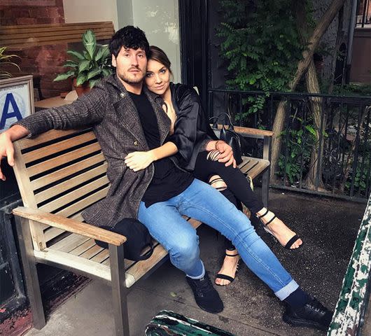 Jenna Johnson/Instagram Val Chmerkovskiy and Jenna Johnson pose on a bench for a photo