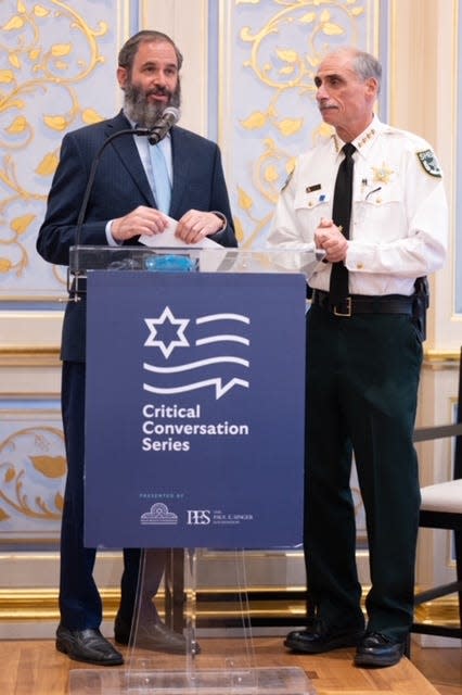 Rabbi Moshe Scheiner of Palm Beach Synagogue honors Volusia County Sheriff Michael Chitwood on Wednesday with the synagogue's 2023 Critical Citizen Award.