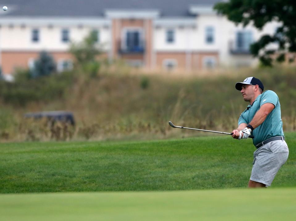 Austin Conroy hits the ball during the championship flight of the 2022 Men’s City Championships, Sunday, July 24, 2022, at the Kampen Golf Course in West Lafayette, Ind. 